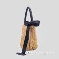 Ladies handbag with bowknot rope